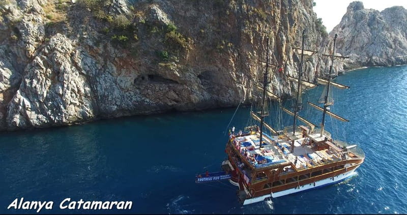 Alanya: Family-Friendly Catamaran Cruise with Castle Views - The cave loop: Pirates, Lovers, and Phosphorus Caves