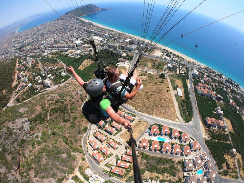 Alanya: Tandem Paragliding from 700m with Meeting or Pick Up - The flight over Alanya: timing, views, and landing on the beach