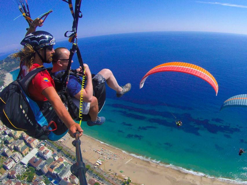 Alanya: Tandem Paragliding with Hotel Pickup - Landing on Cleopatra Beach: What Happens After the Wow